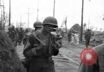 Image of General Mudge and troops of U.S. 1st Cavalry Division Manila Philippines, 1945, second 35 stock footage video 65675071953