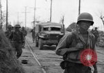 Image of General Mudge and troops of U.S. 1st Cavalry Division Manila Philippines, 1945, second 38 stock footage video 65675071953