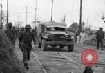 Image of General Mudge and troops of U.S. 1st Cavalry Division Manila Philippines, 1945, second 39 stock footage video 65675071953