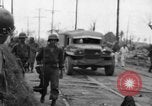 Image of General Mudge and troops of U.S. 1st Cavalry Division Manila Philippines, 1945, second 40 stock footage video 65675071953