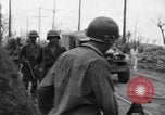 Image of General Mudge and troops of U.S. 1st Cavalry Division Manila Philippines, 1945, second 41 stock footage video 65675071953
