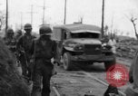 Image of General Mudge and troops of U.S. 1st Cavalry Division Manila Philippines, 1945, second 42 stock footage video 65675071953