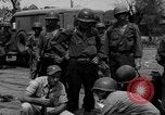 Image of General Mudge and troops of U.S. 1st Cavalry Division Manila Philippines, 1945, second 49 stock footage video 65675071953