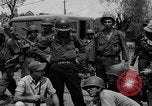 Image of General Mudge and troops of U.S. 1st Cavalry Division Manila Philippines, 1945, second 58 stock footage video 65675071953