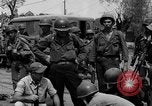 Image of General Mudge and troops of U.S. 1st Cavalry Division Manila Philippines, 1945, second 59 stock footage video 65675071953