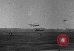 Image of President Coolidge and Secretary of War, Weeks, greet fliers Washington DC USA, 1924, second 58 stock footage video 65675071969