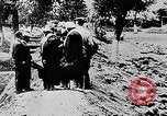 Image of mass burial Ukraine, 1944, second 9 stock footage video 65675071994