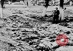 Image of mass burial Ukraine, 1944, second 13 stock footage video 65675071994