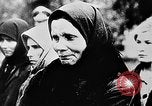 Image of mass burial Ukraine, 1944, second 18 stock footage video 65675071994