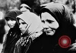Image of mass burial Ukraine, 1944, second 19 stock footage video 65675071994