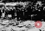 Image of mass burial Ukraine, 1944, second 22 stock footage video 65675071994