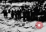 Image of mass burial Ukraine, 1944, second 23 stock footage video 65675071994