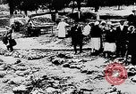 Image of mass burial Ukraine, 1944, second 25 stock footage video 65675071994