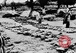 Image of mass burial Ukraine, 1944, second 28 stock footage video 65675071994