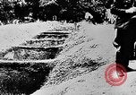 Image of mass burial Ukraine, 1944, second 34 stock footage video 65675071994
