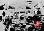 Image of mass burial Ukraine, 1944, second 50 stock footage video 65675071994