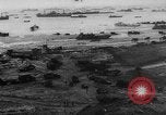 Image of Normandy beachhead filled with reinforcement troops and equipment France, 1944, second 6 stock footage video 65675072013