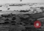 Image of Normandy beachhead filled with reinforcement troops and equipment France, 1944, second 9 stock footage video 65675072013
