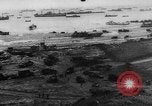 Image of Normandy beachhead filled with reinforcement troops and equipment France, 1944, second 11 stock footage video 65675072013