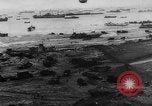 Image of Normandy beachhead filled with reinforcement troops and equipment France, 1944, second 12 stock footage video 65675072013
