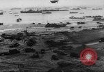 Image of Normandy beachhead filled with reinforcement troops and equipment France, 1944, second 13 stock footage video 65675072013