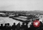 Image of Normandy beachhead filled with reinforcement troops and equipment France, 1944, second 14 stock footage video 65675072013