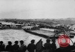 Image of Normandy beachhead filled with reinforcement troops and equipment France, 1944, second 15 stock footage video 65675072013