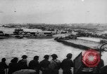 Image of Normandy beachhead filled with reinforcement troops and equipment France, 1944, second 18 stock footage video 65675072013