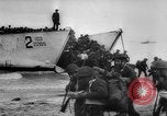 Image of Normandy beachhead filled with reinforcement troops and equipment France, 1944, second 19 stock footage video 65675072013