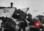 Image of Normandy beachhead filled with reinforcement troops and equipment France, 1944, second 20 stock footage video 65675072013