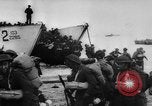 Image of Normandy beachhead filled with reinforcement troops and equipment France, 1944, second 22 stock footage video 65675072013