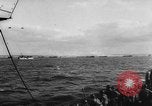 Image of Normandy beachhead filled with reinforcement troops and equipment France, 1944, second 25 stock footage video 65675072013