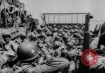 Image of Normandy beachhead filled with reinforcement troops and equipment France, 1944, second 27 stock footage video 65675072013