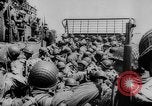 Image of Normandy beachhead filled with reinforcement troops and equipment France, 1944, second 29 stock footage video 65675072013