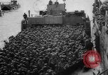 Image of Normandy beachhead filled with reinforcement troops and equipment France, 1944, second 33 stock footage video 65675072013