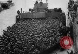 Image of Normandy beachhead filled with reinforcement troops and equipment France, 1944, second 34 stock footage video 65675072013