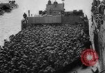 Image of Normandy beachhead filled with reinforcement troops and equipment France, 1944, second 35 stock footage video 65675072013
