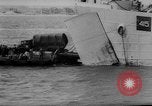 Image of Normandy beachhead filled with reinforcement troops and equipment France, 1944, second 42 stock footage video 65675072013