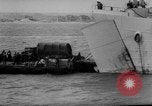 Image of Normandy beachhead filled with reinforcement troops and equipment France, 1944, second 43 stock footage video 65675072013