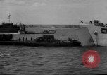 Image of Normandy beachhead filled with reinforcement troops and equipment France, 1944, second 44 stock footage video 65675072013