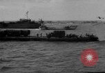Image of Normandy beachhead filled with reinforcement troops and equipment France, 1944, second 46 stock footage video 65675072013