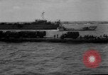 Image of Normandy beachhead filled with reinforcement troops and equipment France, 1944, second 47 stock footage video 65675072013