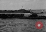 Image of Normandy beachhead filled with reinforcement troops and equipment France, 1944, second 48 stock footage video 65675072013