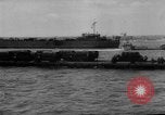 Image of Normandy beachhead filled with reinforcement troops and equipment France, 1944, second 49 stock footage video 65675072013