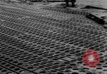 Image of Normandy beachhead filled with reinforcement troops and equipment France, 1944, second 53 stock footage video 65675072013