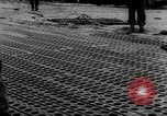 Image of Normandy beachhead filled with reinforcement troops and equipment France, 1944, second 56 stock footage video 65675072013