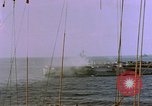Standbild USS Ommaney Bay CVE-79 brennen nach dem Angriff Luzon Philippinen, 1945, aus Sekunde 11 historischem Filmmaterial Videoclip 65675072050