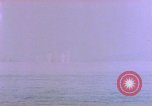 Standbild USS Ommaney Bay CVE-79 brennen nach dem Angriff Luzon Philippinen, 1945, aus Sekunde 40 historischem Filmmaterial Videoclip 65675072050