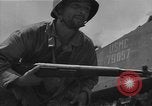 Standbild amerikanische Soldaten Guam, 1945, aus Sekunde 60 historischem Filmmaterial Videoclip 65675072057