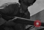 Standbild amerikanische Soldaten Guam, 1945, aus Sekunde 61 historischem Filmmaterial Videoclip 65675072057